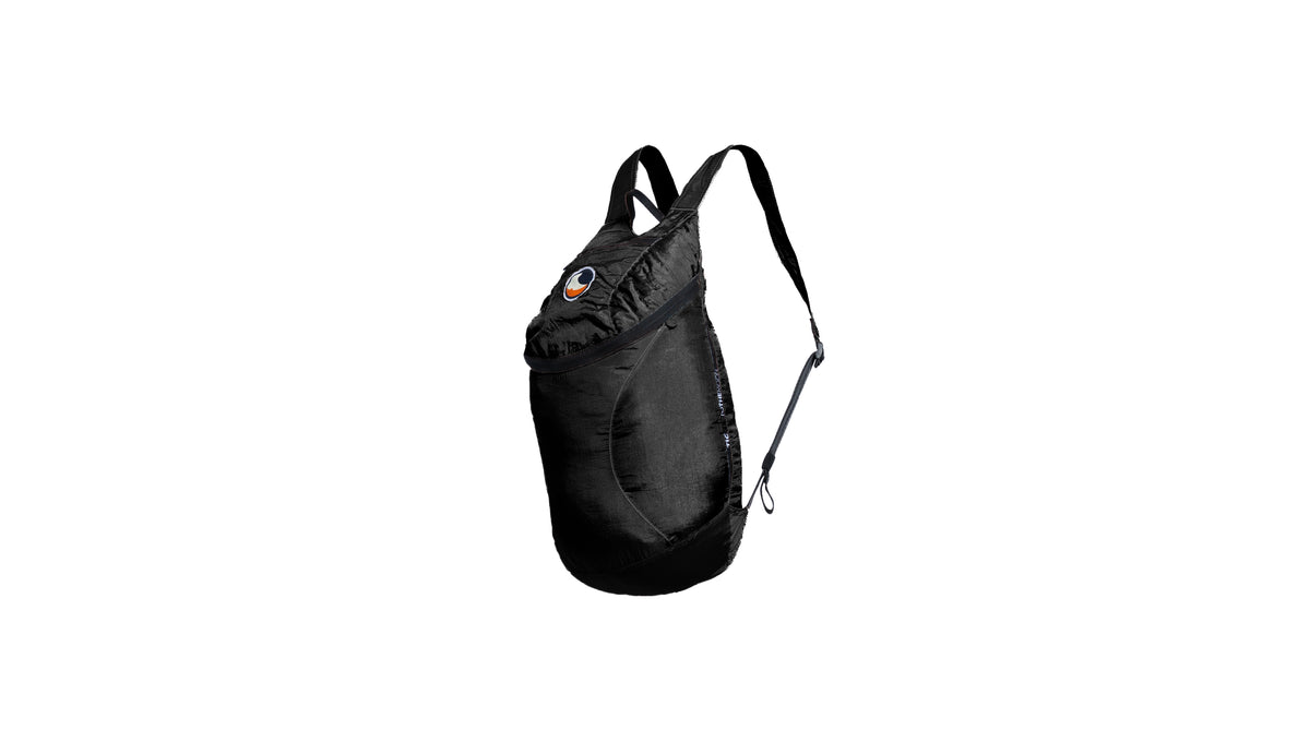 Backpack XS in Black, side view with shoulder strap