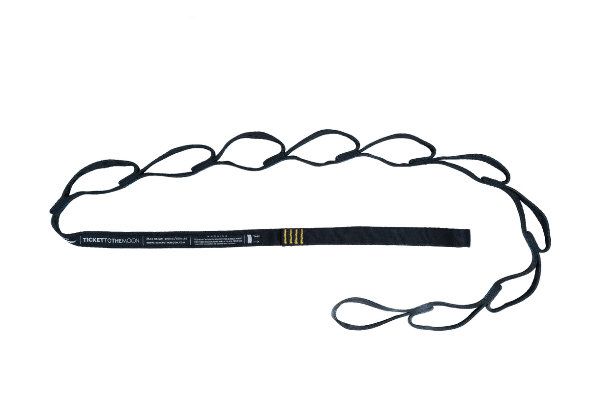 Black Ticket To The Moon daisy-chain strap with multiple loops laid out flat